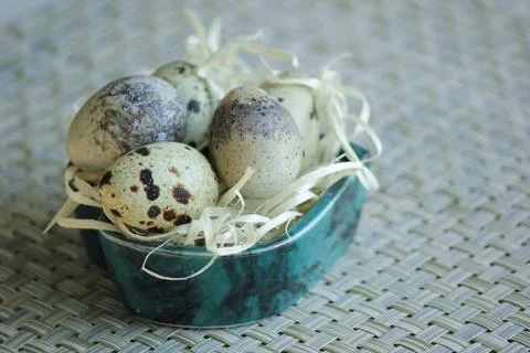 Quail eggs. Background is decorative. Stock Photos