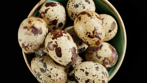 Quail eggs isolated on black background top view. Healthy eating, dieting. Stock Footage 171945515