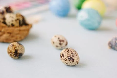 Quail eggs over bright background for easter celebration. Stock Photos
