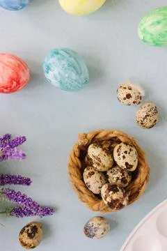 Quail eggs over bright background for easter celebration. Stock Photos