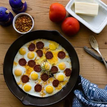 Quail eggs in pan Stock Photos