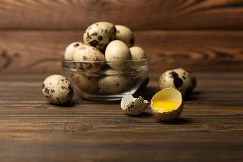 Quail eggs on  texture background. Stock Photos