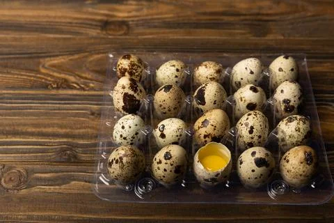 Quail eggs on  texture background Stock Photos