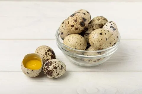 Quail eggs on  texture background Stock Photos