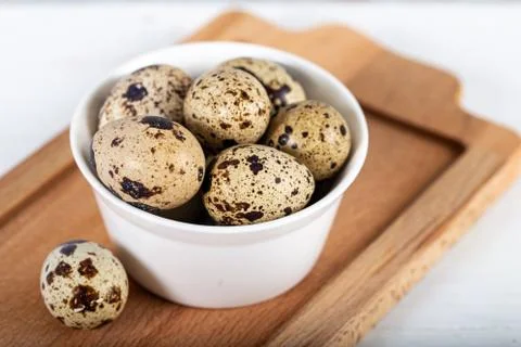 Quail eggs on white background. Foto stock
