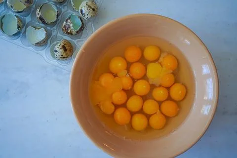 Quail eggs on a white background Stock Photos