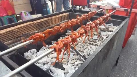 Quails bbq cooking Stock Footage 268483402