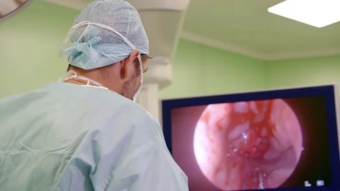Qualified surgeon is performing endoscopic operation in a clinic. Stock Footage 83251242