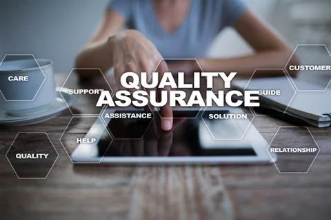 Quality assurance concept on the virtual screen. Business concept. Stock Photos
