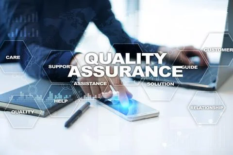 Quality assurance concept on the virtual screen. Business concept. Fotos Stock