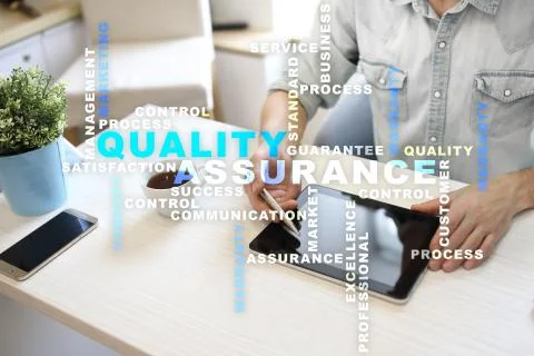 Quality assurance concept on the virtual screen. Business concept. Words clou Fotos Stock