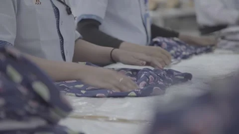 Quality control after they are finished sewing Stock Footage 248798675
