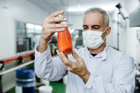 Quality control and food safety inspector test and check product contaminate  Stock Photos