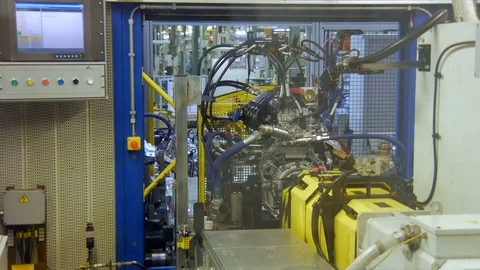 Quality control of car engine on production line, at an automobile factory Stock Footage 77628250