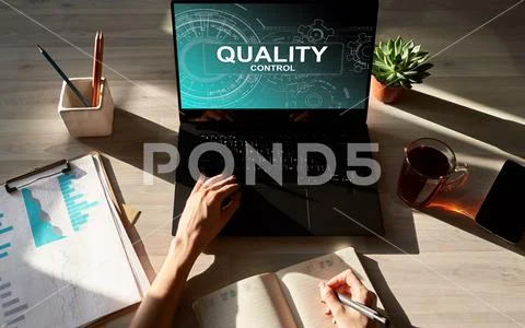 Quality control concept on device screen. Business and technology concept. Stock Photos