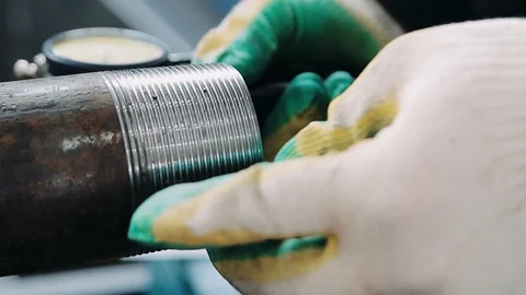 Quality control of Drill pipe production at factory. Checking accuracy of Stock Footage 124740607