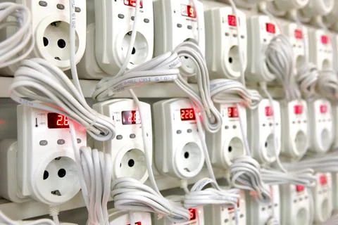 Quality control of electronic devices at the stand. Manufacture of sockets vo Stock Photos