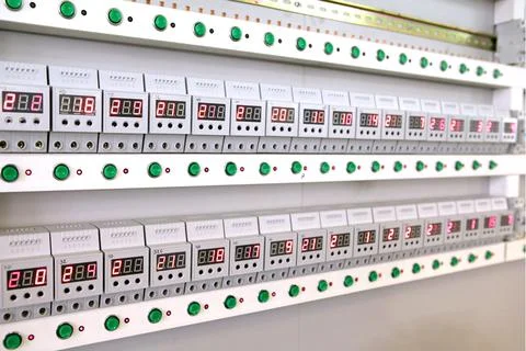 Quality control of electronic devices at the stand. Manufacture of sockets vo Stock Photos