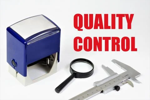 Quality control. An inscription on the background of a document seal. Stock Photos