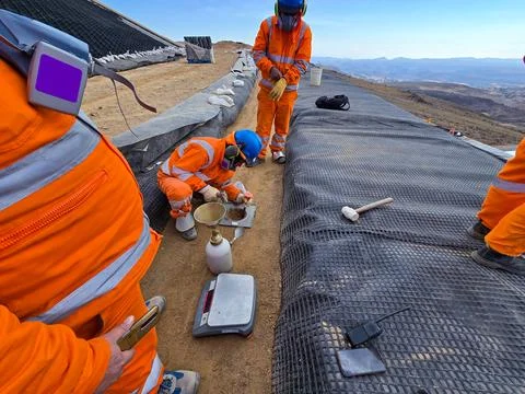 Quality control process for the installation of geosynthetics in a sanitary.. Stock Photos