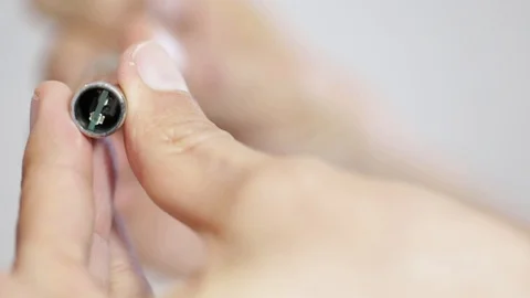 Quality control on a small component Video stock 104600539