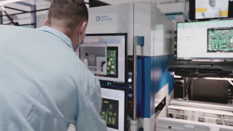 Quality Controls Checking Microchips for details Electronic Factory interior Vídeo Stock 142136286