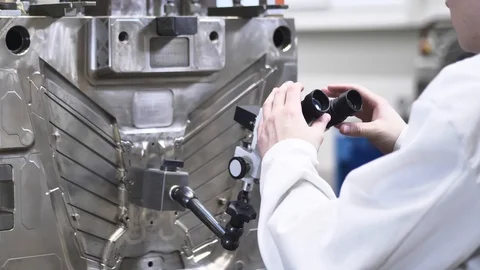 Quality Engineer Checks the Technical Condition of the Injection Mold 動画素材 127030217
