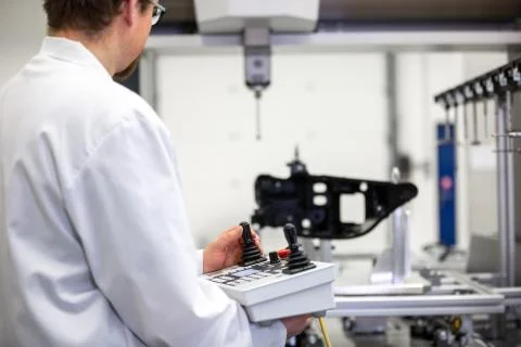 Quality engineer measuring some moldings by professional 3D measuring system Stock Photos