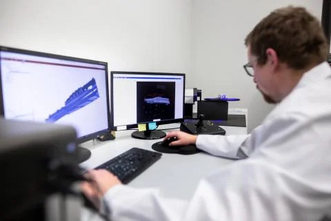 Quality engineer, scanning components by professional optical 3D scanner with a Stock Photos