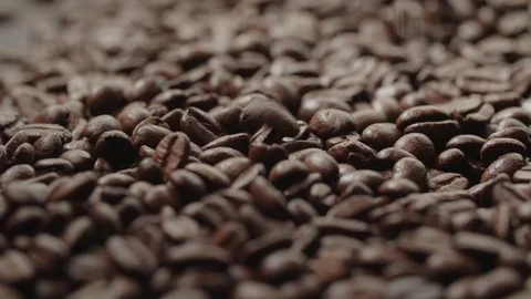 Quality of grain roasted coffee to spill in the bag , slow motion Video stock 70206067