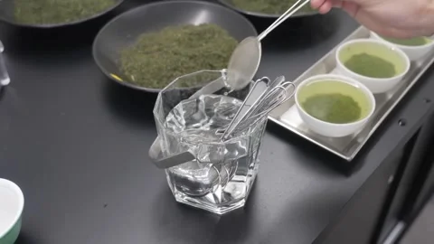 Quality Inspection of Brewed Green Tea and Dried Leaves Vídeos de archivo 340009918