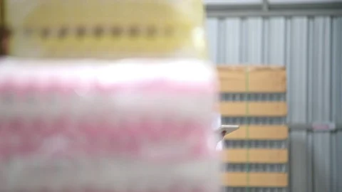 Quality inspector in small warehouse. Stock Footage 92401719