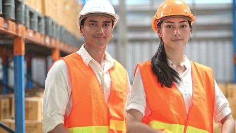 Quality inspector in small warehouse. Stock Footage 92401845