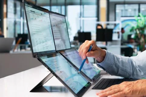 Quality Manager Analyzes Compliance Data On Laptop To Improve Manufacturing P Stock Photos