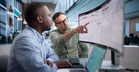 Quality Manager Analyzing Corrective Actions Using Laptop For Manufacturing C Stock Photos