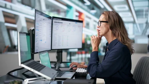 Quality Manager Reviewing Audit Reports On Laptop For Regulatory Compliance Stock Footage 346324931