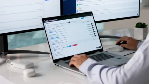 Quality Manager Reviewing CAPA Reports For Process Improvement Stock Footage 335456488