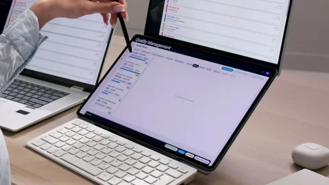Quality Manager Reviewing Software Dashboard For Corrective Actions Stock Footage 335456790