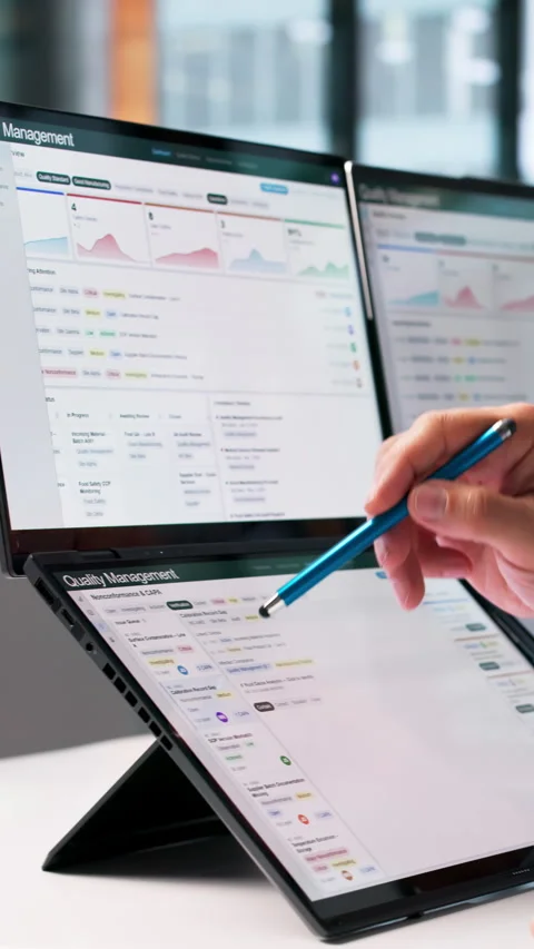 Quality Manager Reviews Compliance Data On Laptop Stock Footage 344711821