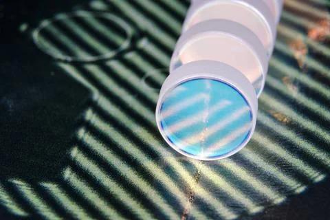 Quality optics row of optical components on the interference inspection sh... Stock Photos