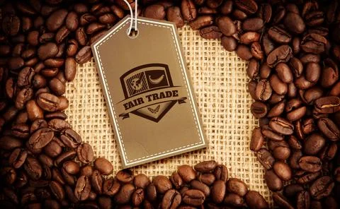 Quality tag over speech bubble surrounded by coffee beans Stock Photos