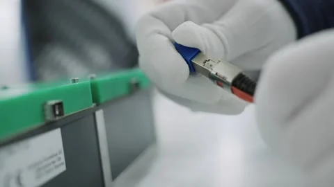 Quality testing of cable assembly process in a modern technology production e Stock Footage 331891596