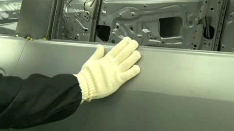 Quality testing with hand in automobile factory 動画素材 35302117