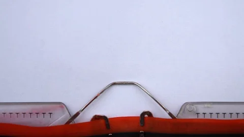 Quality - word printed on an old typewriter in red letters, close up. Stock Footage 126777271