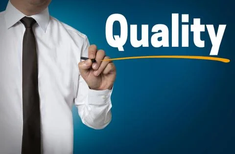 Quality is written by businessman background concept Stock Photos