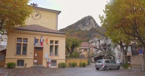 Quant old town of Annot with Town hall aka Mairie d'Annot and sandstone Stock Footage 332602829