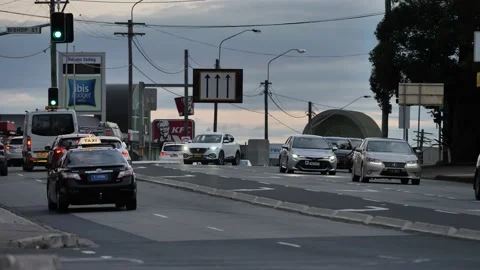 Quantas plane landing in Sydney and passing traffic slow motion 4K Video stock 221001036