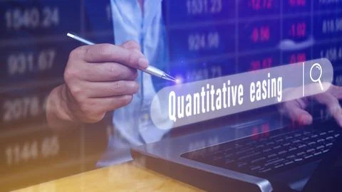 Quantitative easing written in search bar with the financial data visible o.. Stock Photos