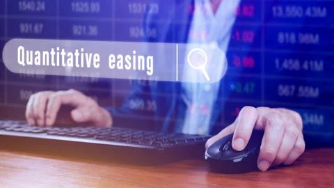 Quantitative easing written in search bar with the financial data visible o.. Stock Photos