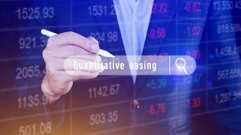 Quantitative easing written in search bar with the financial data visible o.. Stock Photos